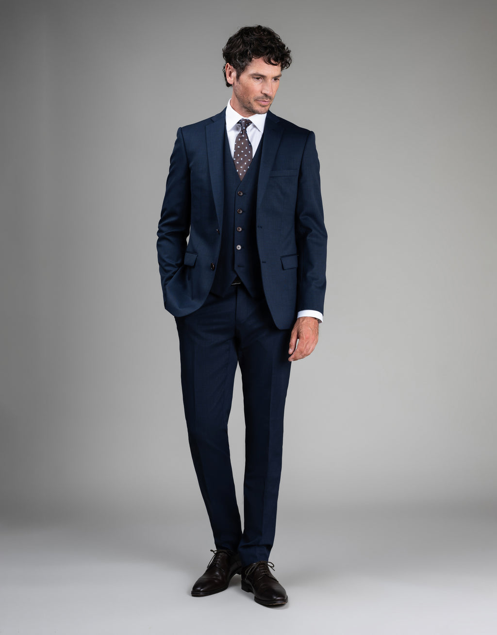 Tom is 185cm wearing size 96 Regular jacket & 84 trouser